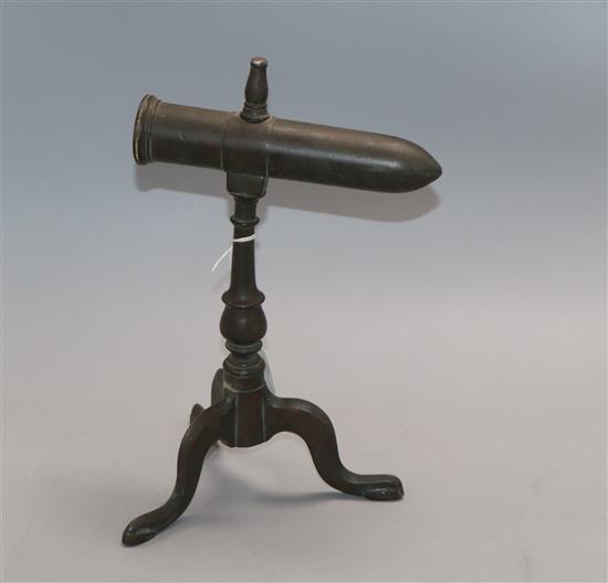 A Georgian bronze collar iron on tripod stand